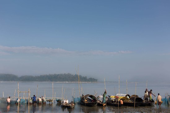 fishermen in Brahamaputra river